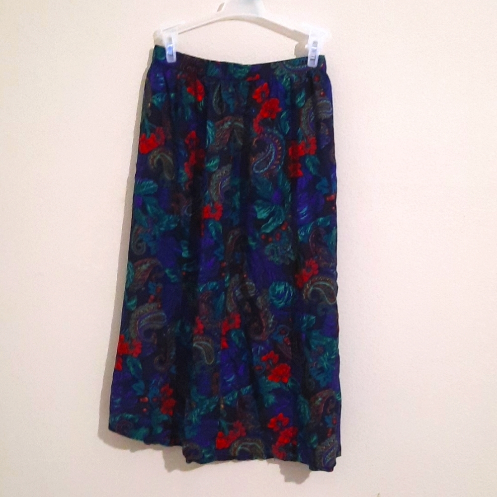 Ankle length, button adjustable, elastic, size 14 paisley skirt.